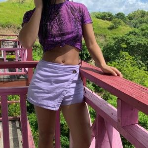 Purple mini skort with button